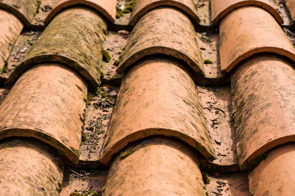 Close view of clay tile courses on a Spanish-style roof